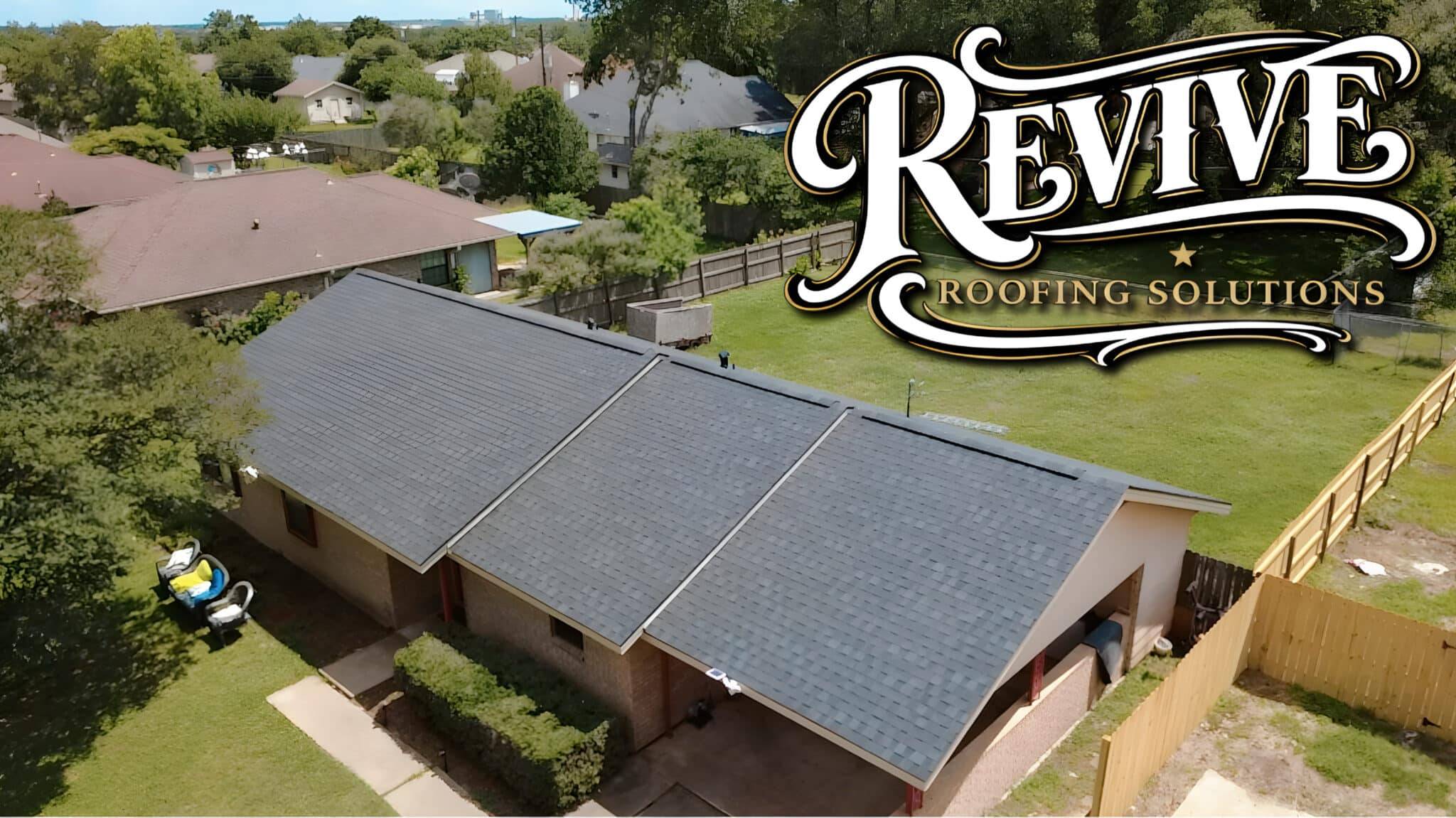 Aerial view of a brick ranch home with a new shingle roof