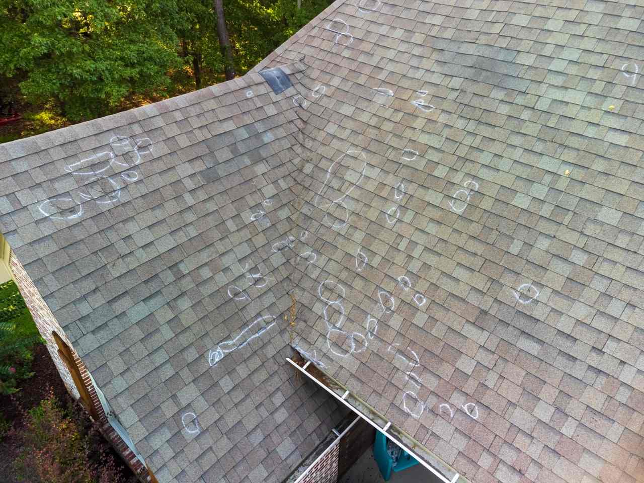 Weathered, aged shingles on a roof